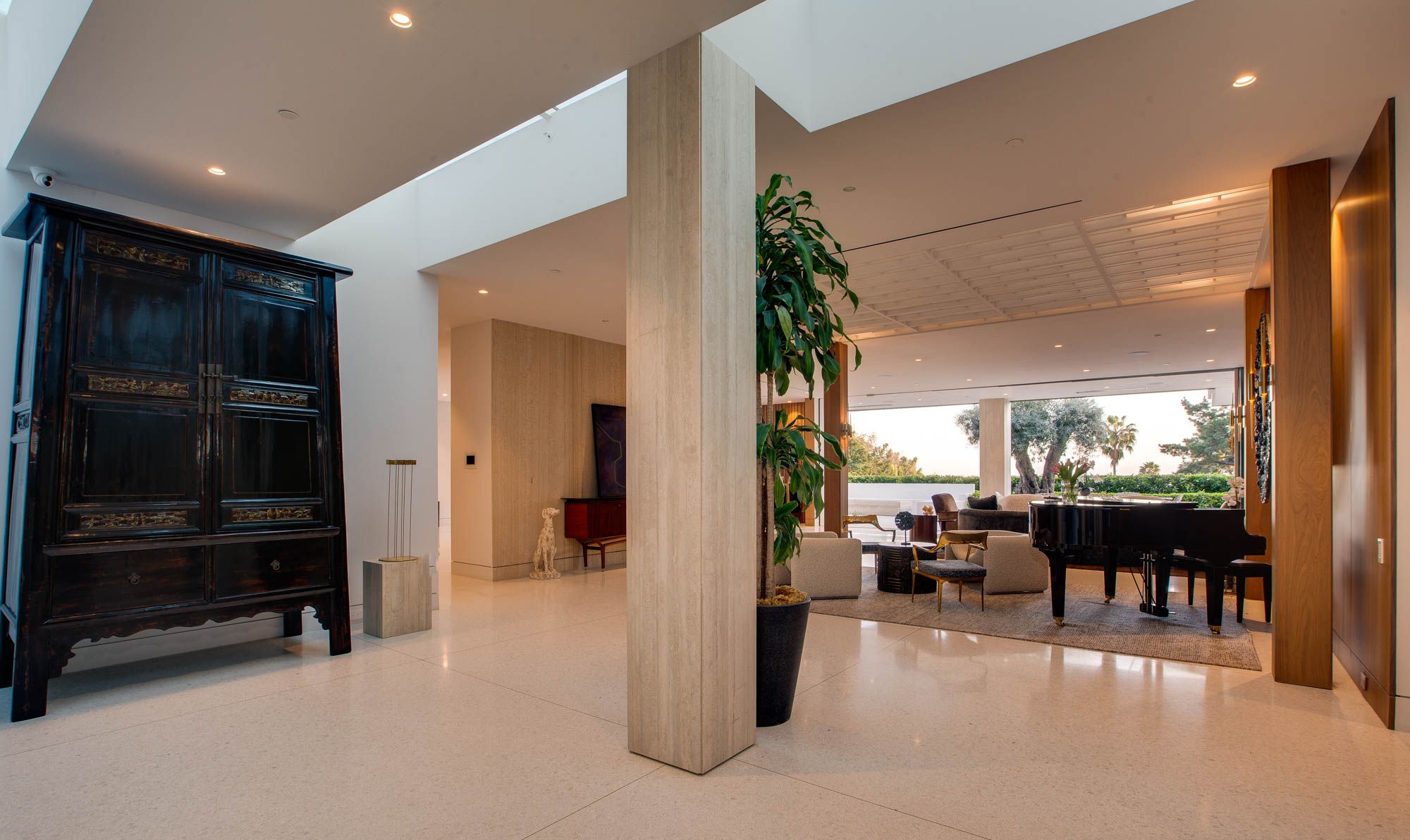 A large room with many chairs and tables.